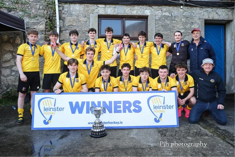 The team celebrating after winning the Railway Cup.